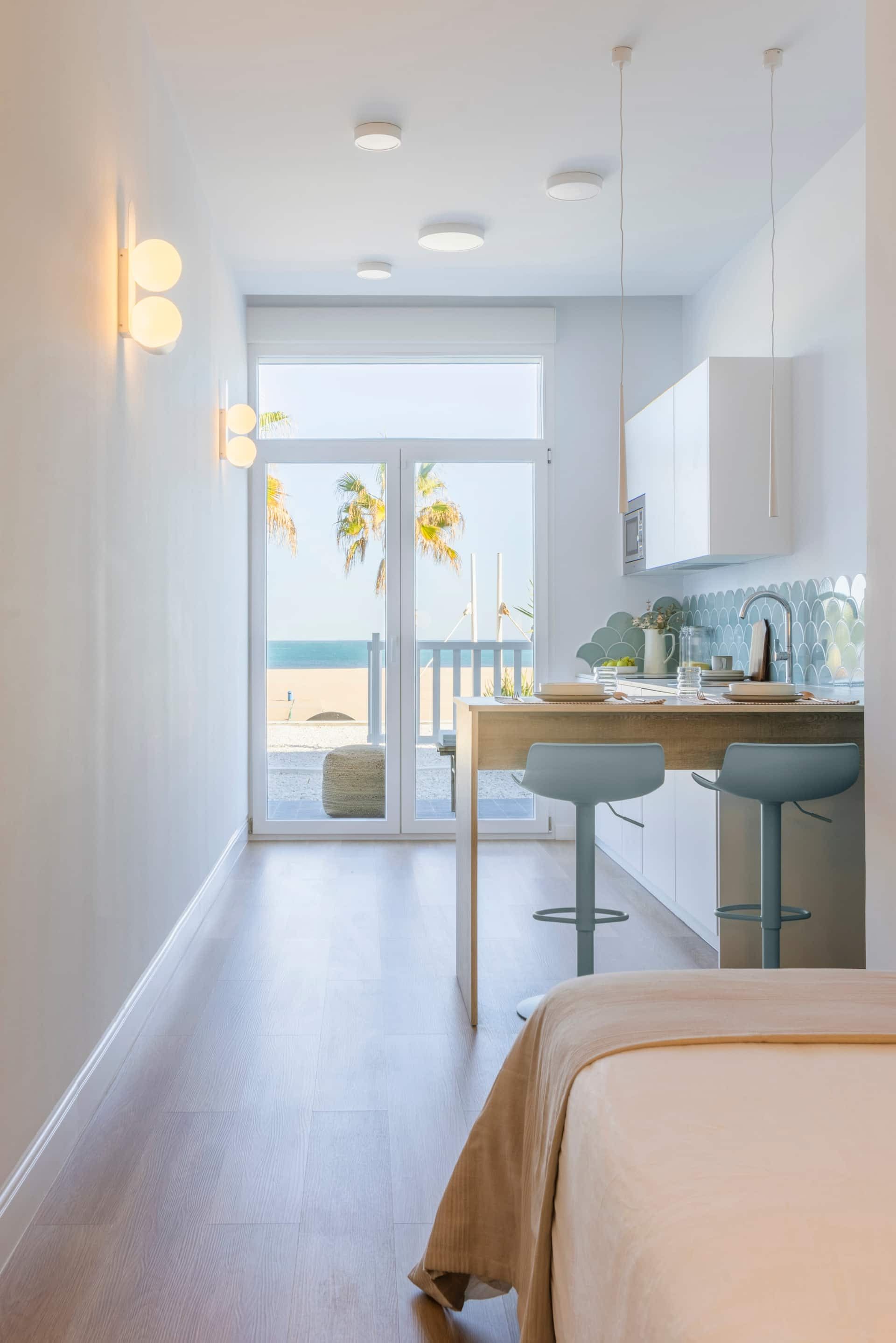 Kitchen opening onto the sea view, apartment 2